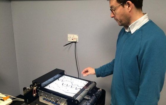 Tom Richards demonstrates his Mini-Oramics Machine